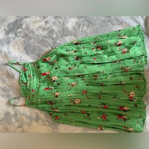 Green floral pleated shirt.